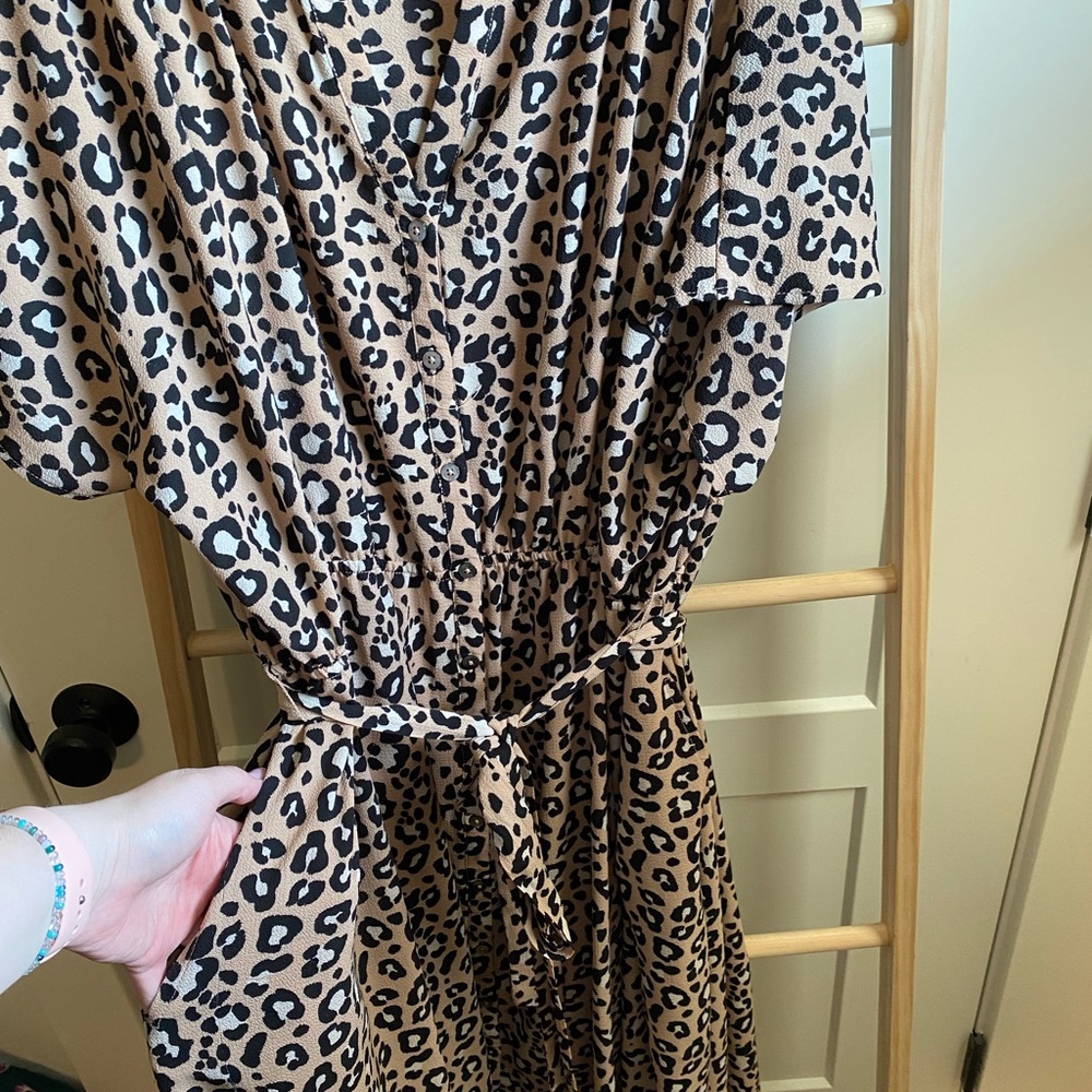 Animal print dress with pockets.